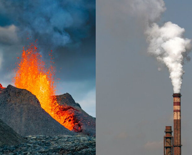 Wybuchający wulkan i dymiący komin fabryki