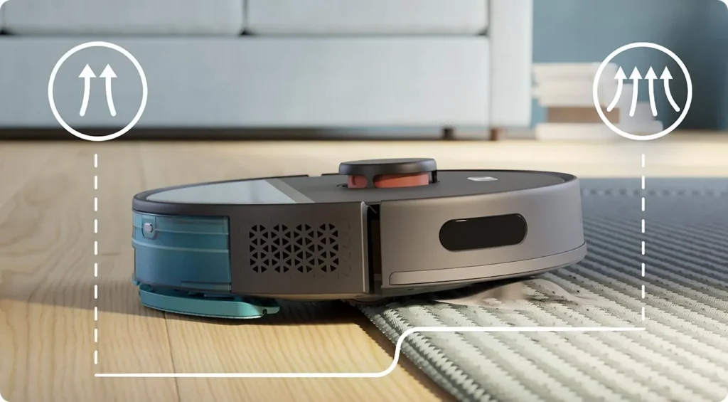Dopasowanie mocy ssania w zależności od wykrytej powierzchni. sprzątający w salonie z psem. Materiały producenta Philips