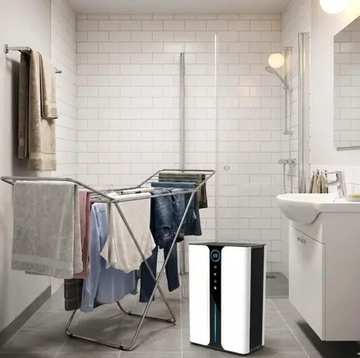 Osuszacz powietrza Norada suszący pranie w łazience